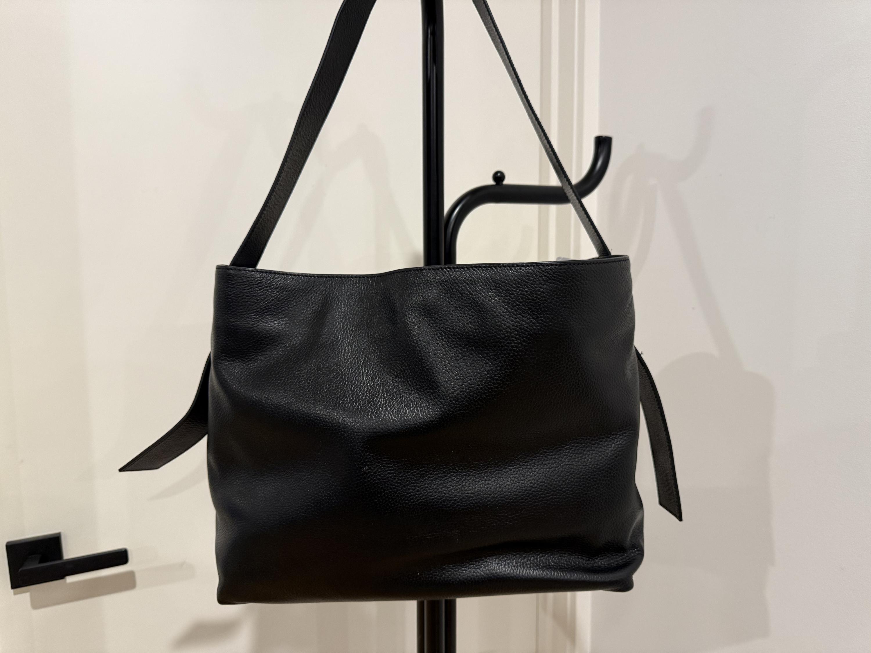 Assembly Label Black Leather Bag